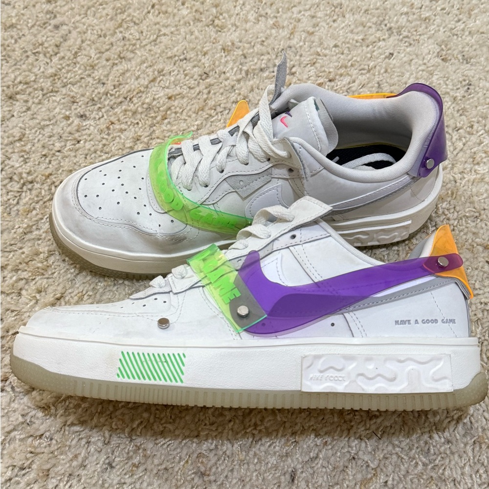 Nike woman’s White and Purple Sneakers with Green Accents glow in the dark sole